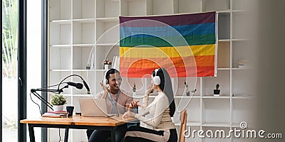 Podcaster is interviewing a guest about the content topic of LGBTQIA. Podcast concept Stock Photo