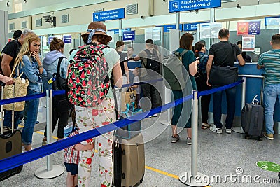 Passport control at the International Airport of Podgorica in Montenegro Editorial Stock Photo