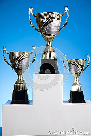 Podium, Winner trophy, Sport equipment and balls Stock Photo