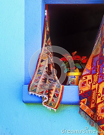 Poinsetta in Open Window at Christmas, Mexico Stock Photo