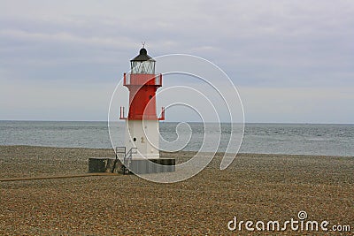 Point of Ayre lighthouse on beach Stock Photo