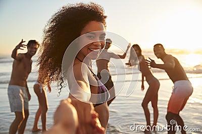 Point Of View Shot Of Friends Enjoying Summer Beach Vacation Stock Photo