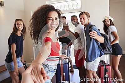 Point Of View Shot Of Friends Leaving Summer Vacation Rental Stock Photo