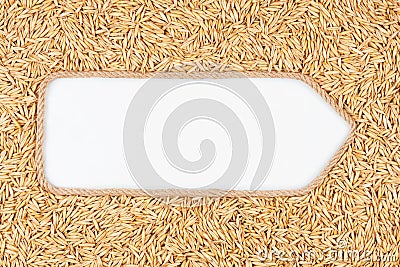 Pointer made from rope with grains oats lying on a white background Stock Photo