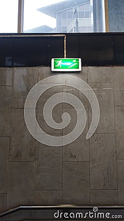 a pointer towards the emergency exit from the subway Stock Photo