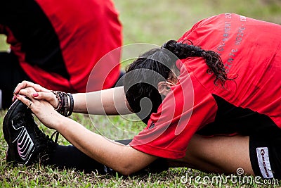 POINTNOIRE/CONGO - 18MAY2013 - Amateur female rugby player to warm up Editorial Stock Photo