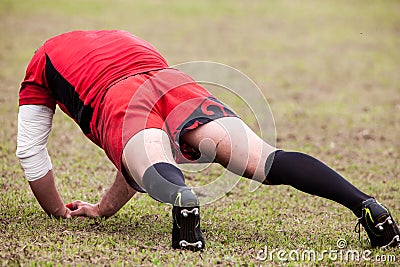 POINTNOIRE/CONGO - 18MAY2013 - Amateur rugby player to warm up Editorial Stock Photo