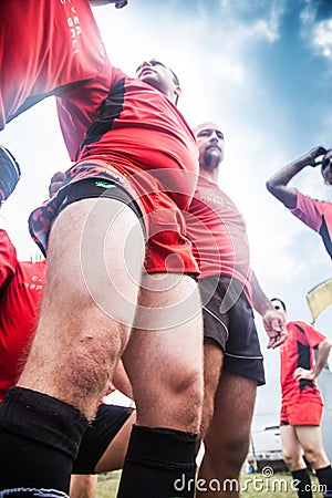 POINTNOIRE/CONGO - 18MAY2013 - Team of amateur friends playing rugby Editorial Stock Photo