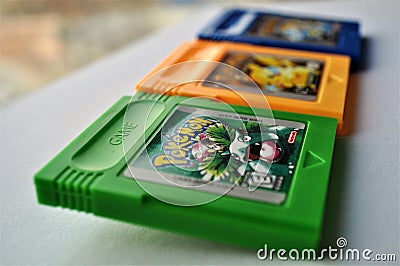 Pokemon Blue, Yellow, and Green game sideview Editorial Stock Photo