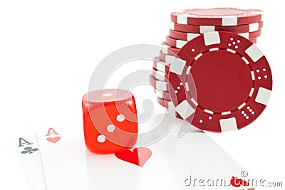 Poker chips, cards and red dice cube Stock Photo