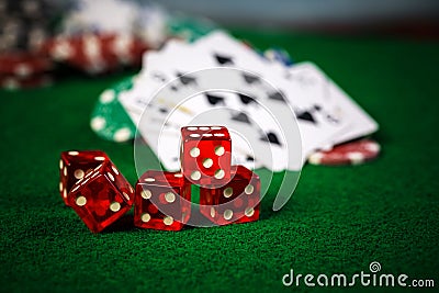 Poker Chips in casino gamble green table. Stock Photo