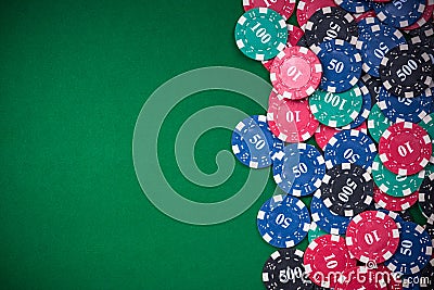 poker chips on green casino table, border background Stock Photo