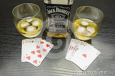 Poker. Four of a kind - out of sixes against Kings. To drink a g Editorial Stock Photo