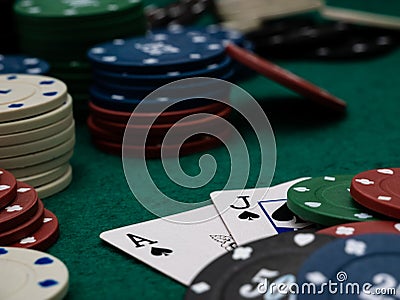 poker game table, ace and jack blackjack score with stack of playing chips Stock Photo