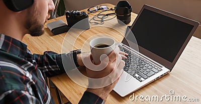Poker gamer concept. Modern workspace of professional artist or photographer, working on laptop computer, tablet , music creator, Stock Photo