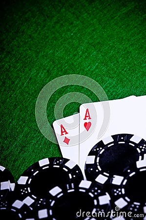 Poker hand with chips, Pocket Aces Stock Photo
