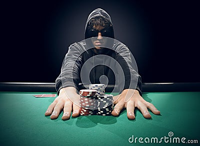 Poker player going all-in Stock Photo