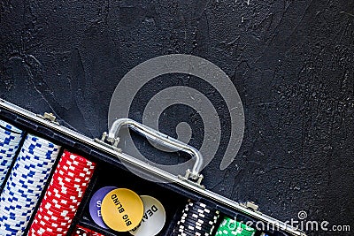 Poker set in a metallic case on a grey table top view copyspace Stock Photo