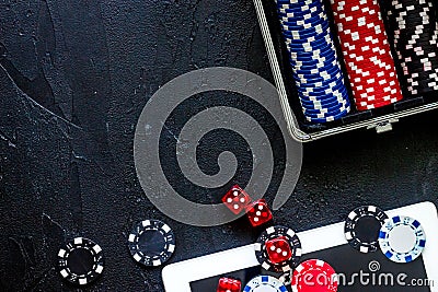 Poker set in a metallic case on a grey table top view copyspace Stock Photo