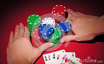 Poker table. All in with four of a kind. Stock Photo