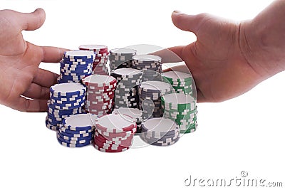 Pokerchips with hands Stock Photo