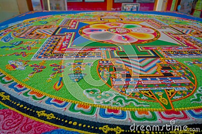 POKHARA, NEPAL - OCTOBER 06 2017: Close up of collection of colorful typical traditional carved floor, nepalese inside Editorial Stock Photo