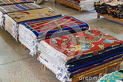 Shop with hand-woven carpets in Tashi Ling village. Editorial Stock Photo