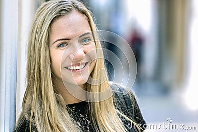 A poland blonde young woman, 24 years, looking camera, smiling, outdoors Stock Photo
