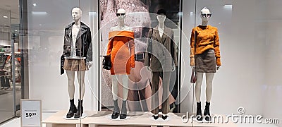 Poland, Bydgoszcz - September 20, 2022: HM AutumnWinter 2022 collection. Female mannequins in a shop window Editorial Stock Photo