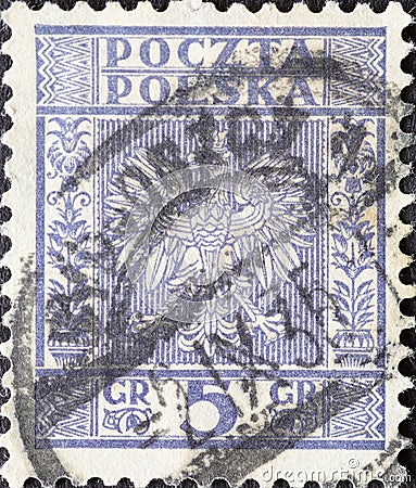 POLAND-CIRCA 1932 : A post stamp printed in Poland showing the heraldic animal of the eagle in the Coat of Arms of Poland - Vertic Editorial Stock Photo