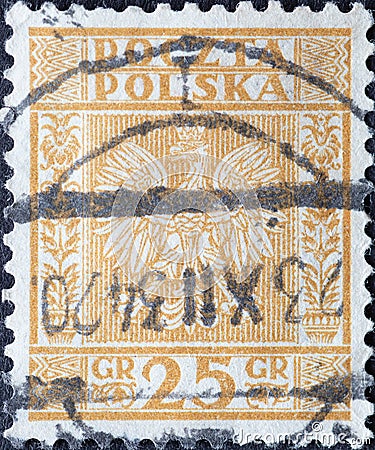 POLAND-CIRCA 1932 : A post stamp printed in Poland showing the heraldic animal of the eagle in the Coat of Arms of Poland - Vertic Editorial Stock Photo