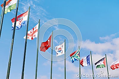 Poland, Denmark, Czech Republic, France, China flags on sky Stock Photo