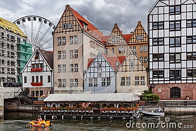 Poland Gdansk 13 September 2018 View of the Motlawa River with its water taxi, the various colored houses along the shore, the Fer Stock Photo