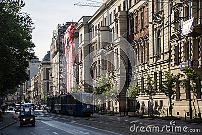 Poland krakow - 08.05.2015 - old tram carriages transportation train downtown area historic buildings Editorial Stock Photo