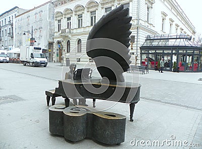 Poland, Lodz, Piotrkowska 78, monument to Polish pianist Arthur Rubinstein Editorial Stock Photo