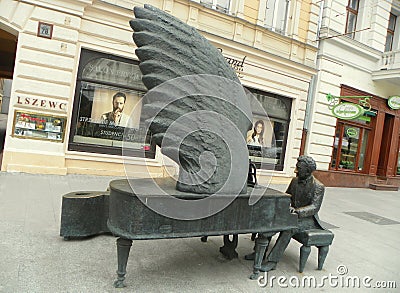 Poland, Lodz, Piotrkowska 78, monument to Polish pianist Arthur Rubinstein Editorial Stock Photo