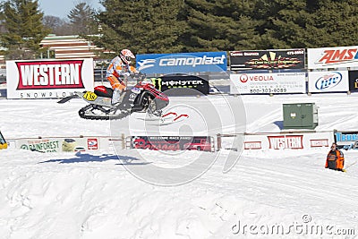 Polaris Red & Black Snowmobile High in the Air 3 Editorial Stock Photo