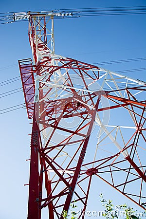 Pole high-voltage transmission voltage white red for several high-vold... Stock Photo