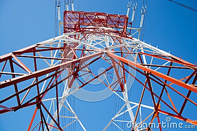 Pole high-voltage transmission voltage white red for several high-vold... Stock Photo