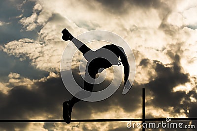 Pole vault back light Stock Photo