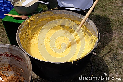 Polenta in caldron traditional recipe Stock Photo