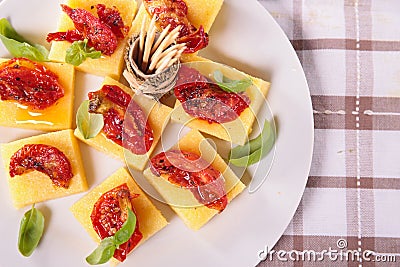 polenta,tomato and basil Stock Photo