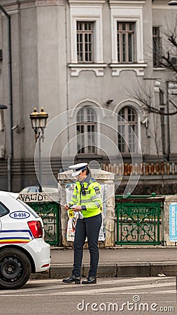 Police agent, Romanian Traffic Police (Politia Rutiera) directing traffic Editorial Stock Photo