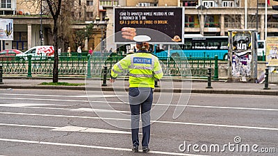 Police agent, Romanian Traffic Police (Politia Rutiera) directing traffic Editorial Stock Photo