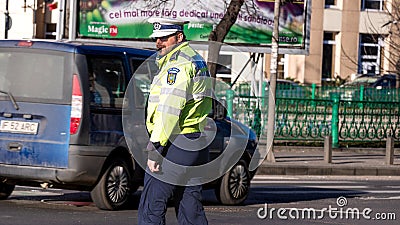 Police agent, Romanian Traffic Police (Politia Rutiera) directing traffic Editorial Stock Photo
