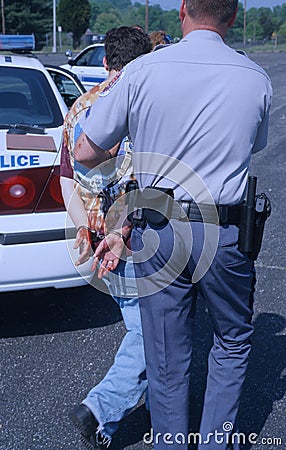 Police arrest a subject Editorial Stock Photo