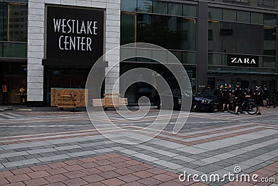 Police on bicycles and sheets of plywood in front of westlake center preparing for events on May 30 2020 Editorial Stock Photo