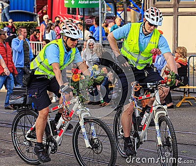 Police bicyclists during the Sechselauten parade in Zurich Editorial Stock Photo