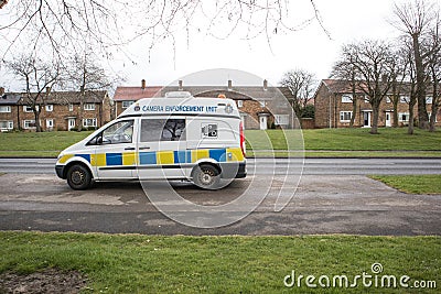 Police Camera Enforcement Unit Van parked at side of the road to enforce speed restrictions. Speed camera sign visable Editorial Stock Photo