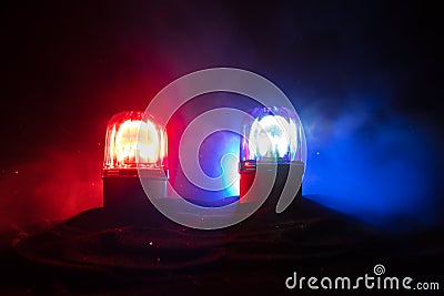 Police car blue and red round vintage siren in dark. Rotating retro style police siren in dark Stock Photo